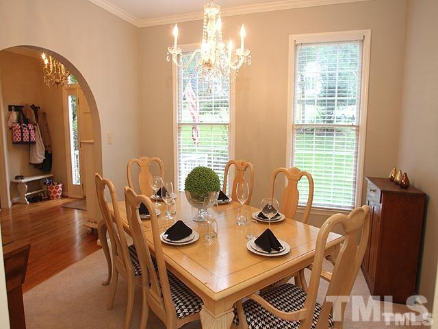 5944 Dunbarton Way Raleigh, NC 27613 - Photo 8 of 19 a view of a dining room with furniture and wooden floor