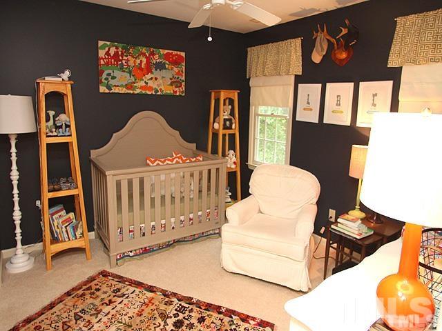 5944 Dunbarton Way Raleigh, NC 27613 - Photo 10 of 19 a bedroom with furniture and a window