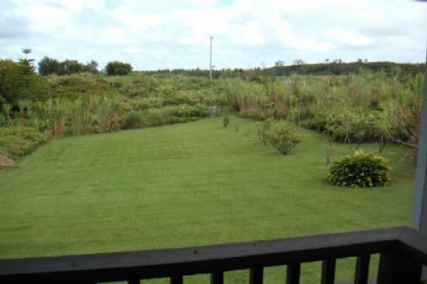 2579 Kaiwiki Road Hilo, HI 96720 - Photo 3 of 3 a view of a lake with a yard