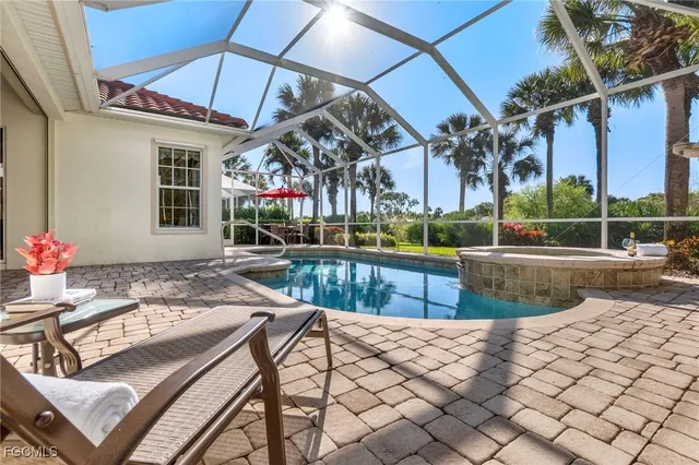 a view of house with outdoor seating