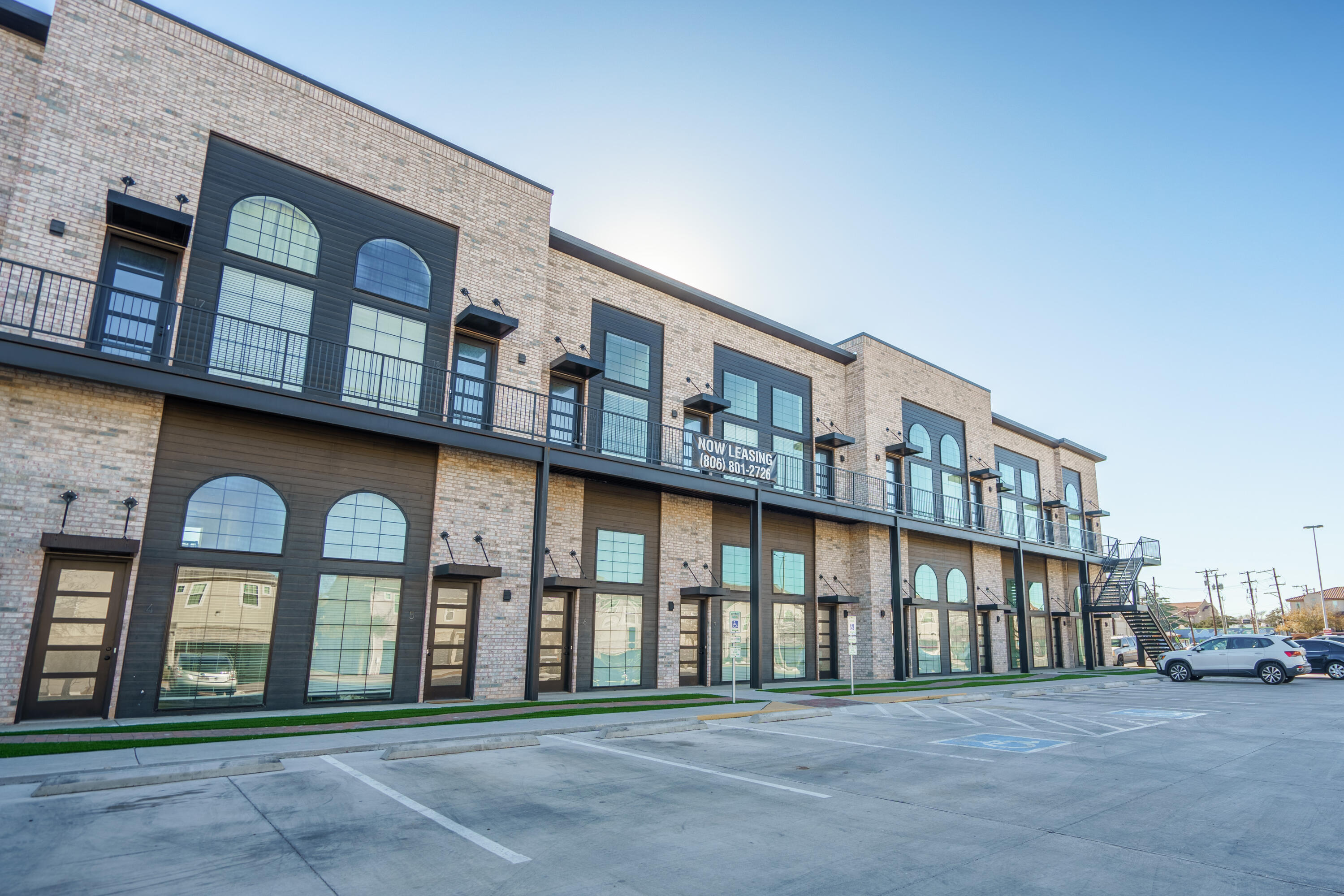 2007 Main Street, Unit 3 Lubbock, TX 79401 - Photo 2 of 23 a front view of building with multiple windows