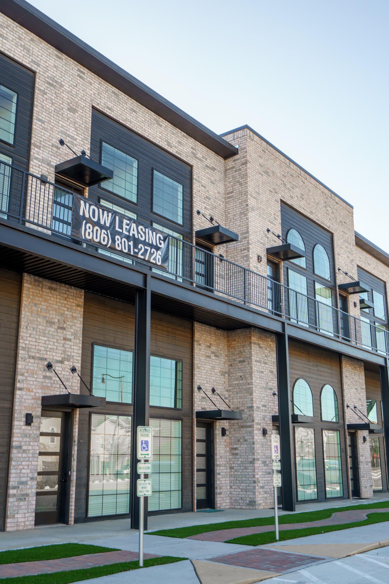 2007 Main Street, Unit 3 Lubbock, TX 79401 - Photo 23 of 23 a view of a brick building with a outdoor space