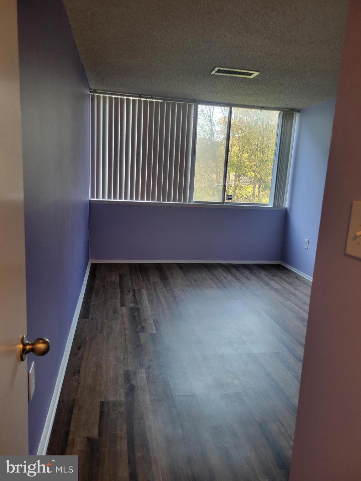 1830 Metzerott Road, Unit 103 Hyattsville, MD 20783 - Photo 18 of 41 an empty room with a window