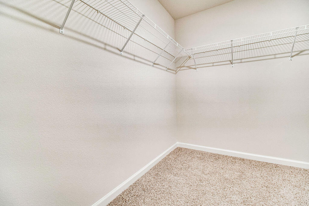 924 Sandbar Loop Crestview, FL 32539 - Photo 21 of 34 a view of a room with racks on the wall