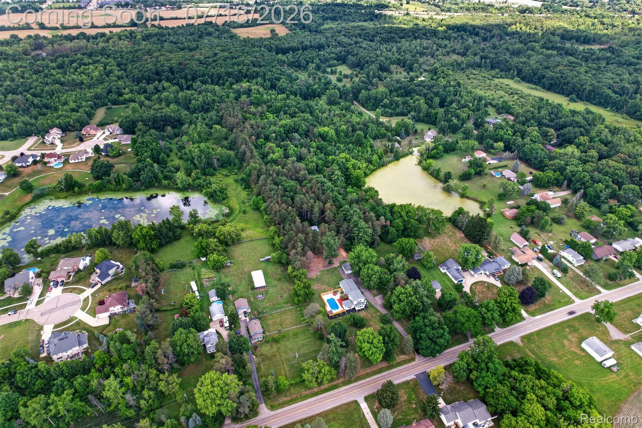 1437 East Cook Road Grand Blanc, MI 48439 - Photo 26 of 69 Expansive wooded acreage featuring two distinct ponds and residential developments