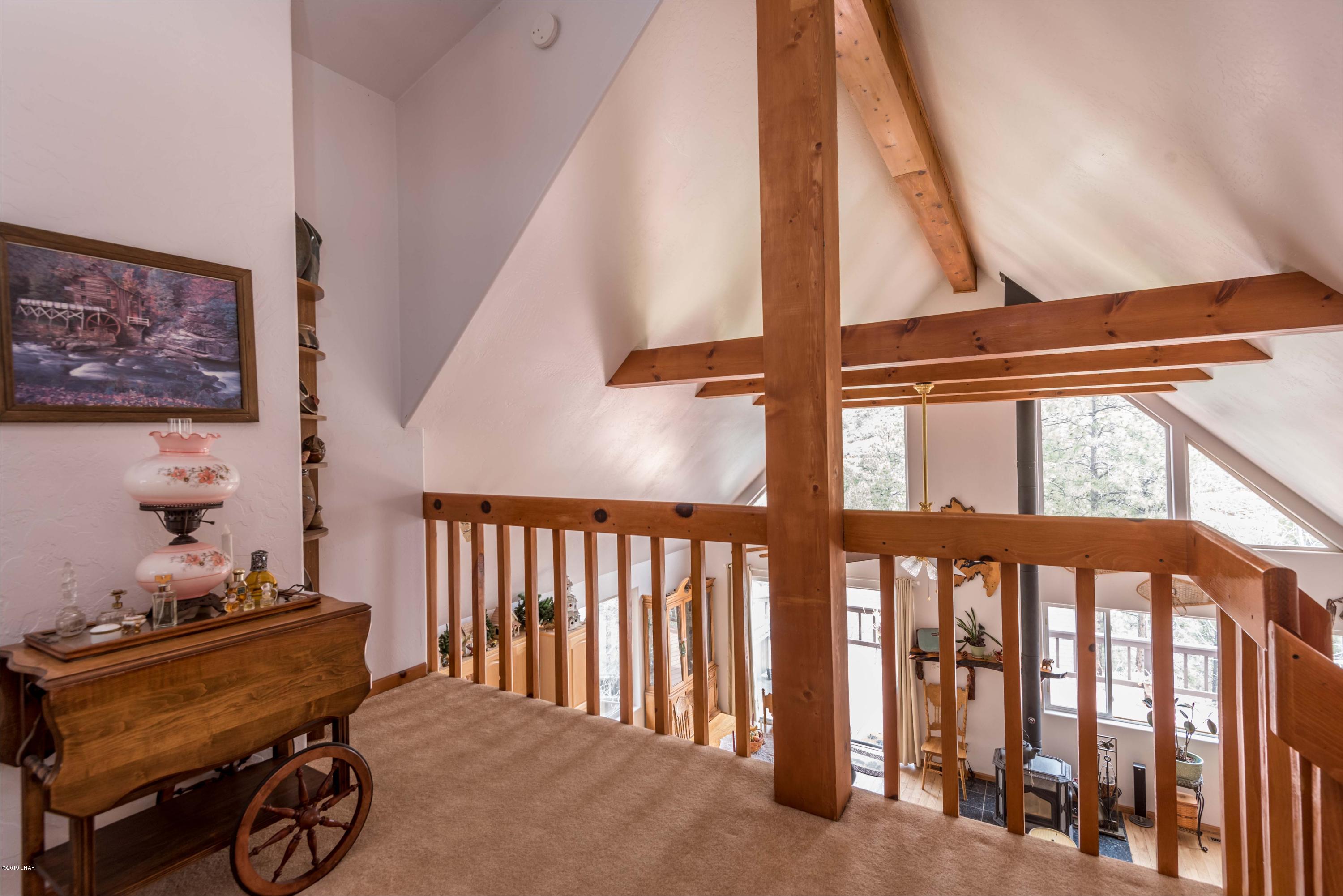 4690 South Hansen Road Kingman, AZ 86401 - Photo 26 of 94 Landing for Master Suite 2. Over looks living area.
