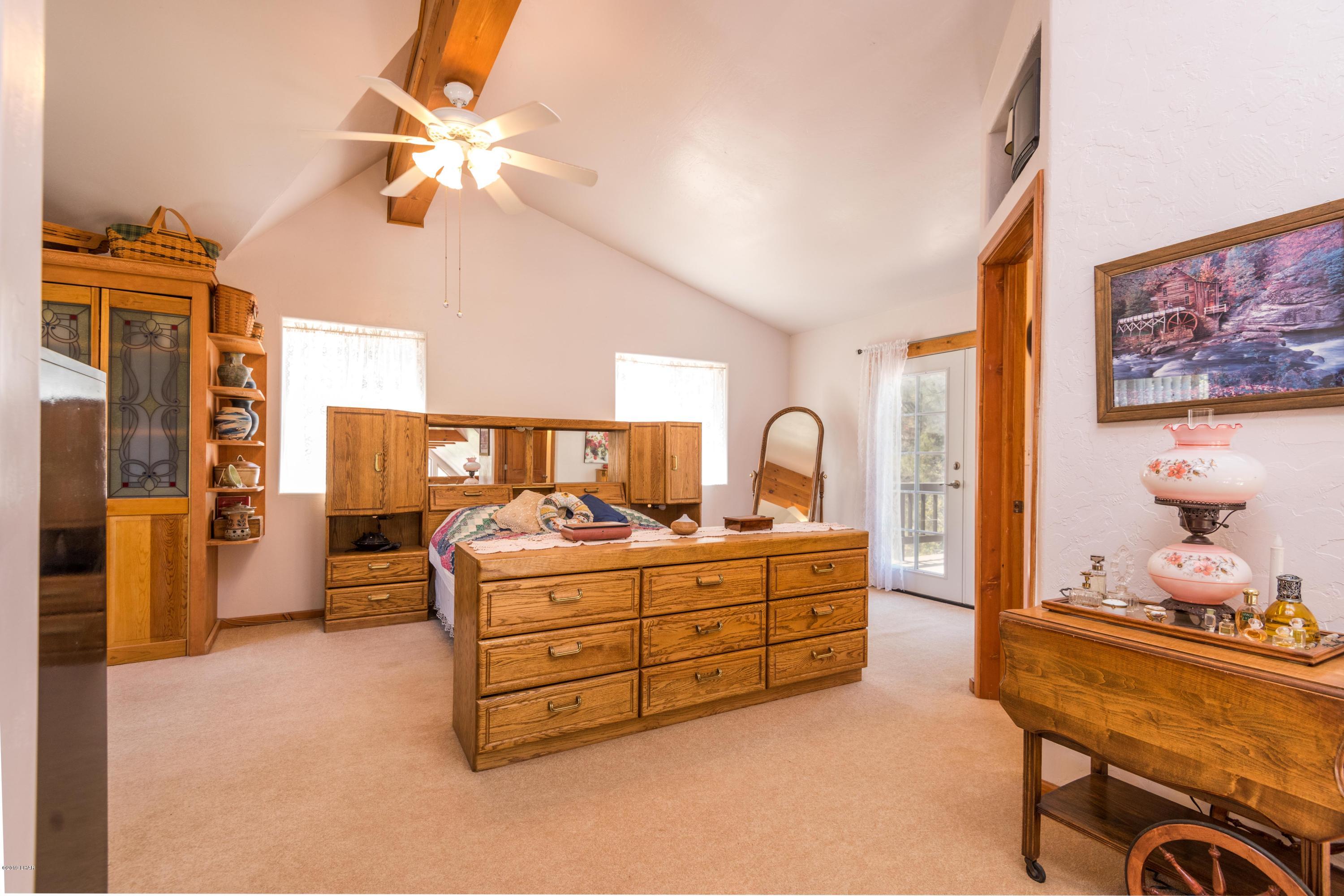 4690 South Hansen Road Kingman, AZ 86401 - Photo 29 of 94 Master suite 2. Also has a private deck off this suite.