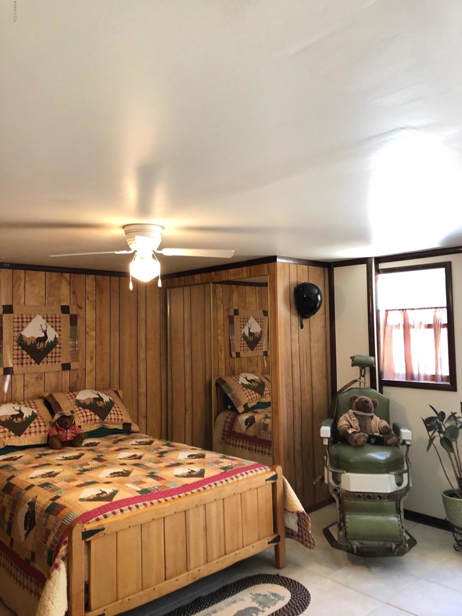 4690 South Hansen Road Kingman, AZ 86401 - Photo 36 of 94 Master Suite 3 on ground level. Has it's own entrance and locks between main house and Suite.