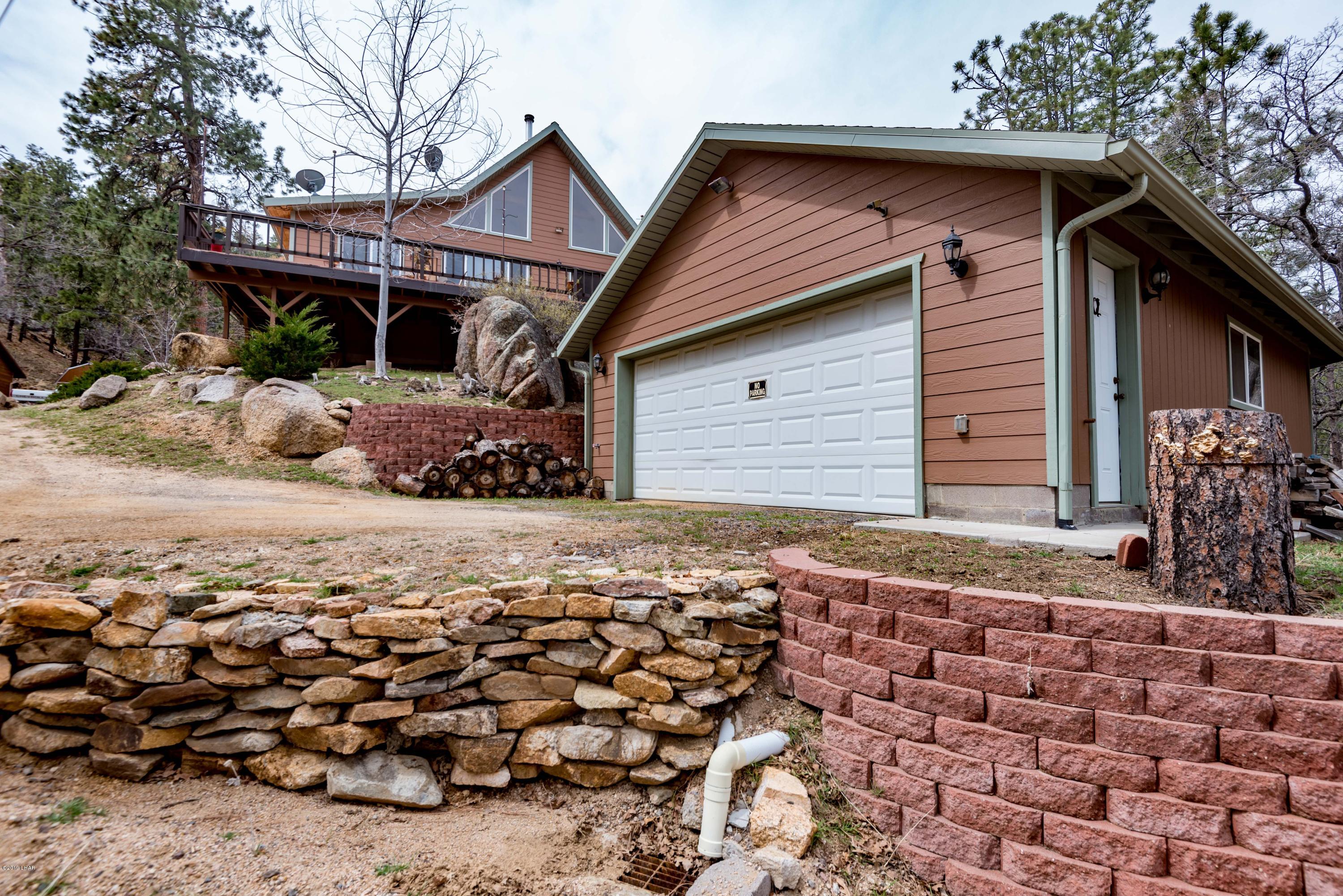 4690 South Hansen Road Kingman, AZ 86401 - Photo 43 of 94 Below is a two car garage with work shop.