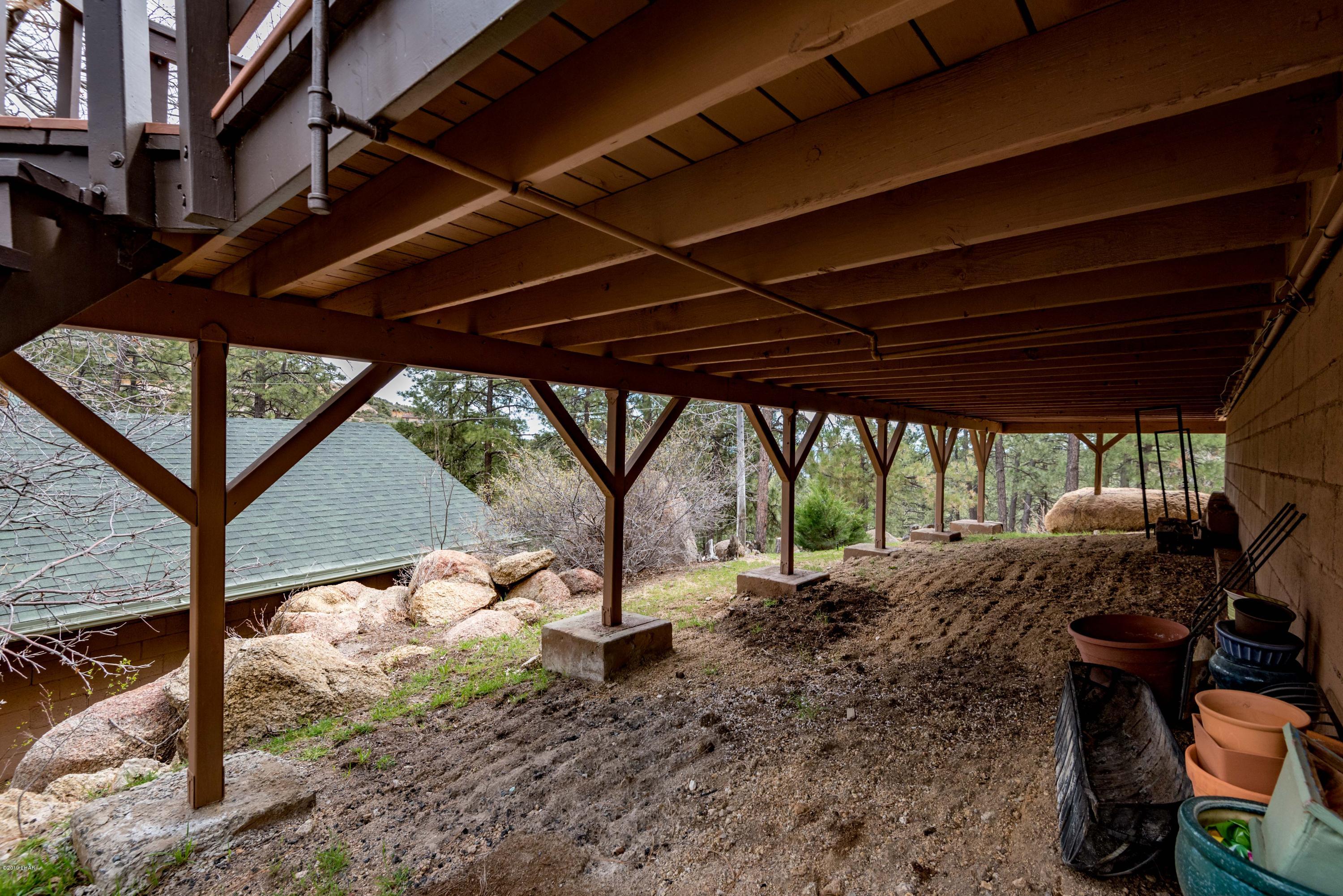 4690 South Hansen Road Kingman, AZ 86401 - Photo 74 of 94 Space under deck for additional storage.