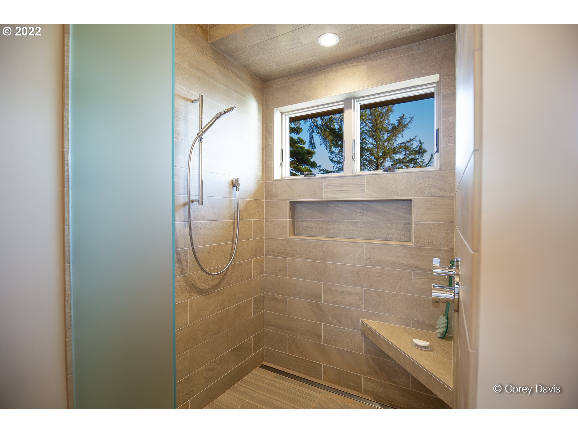 38500 Beulah Reed Road Nehalem, OR 97131 - Photo 21 of 30 a bathroom with a glass shower door