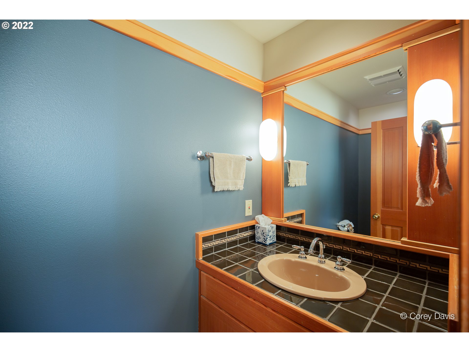 38500 Beulah Reed Road Nehalem, OR 97131 - Photo 27 of 30 a bathroom with a sink and a mirror