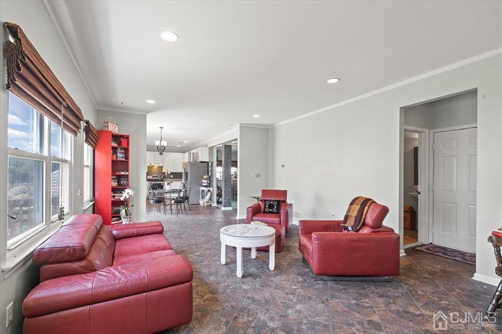 22 Mapleton Road Old Bridge, NJ 08857 - Photo 18 of 40 a living room with furniture and a large window