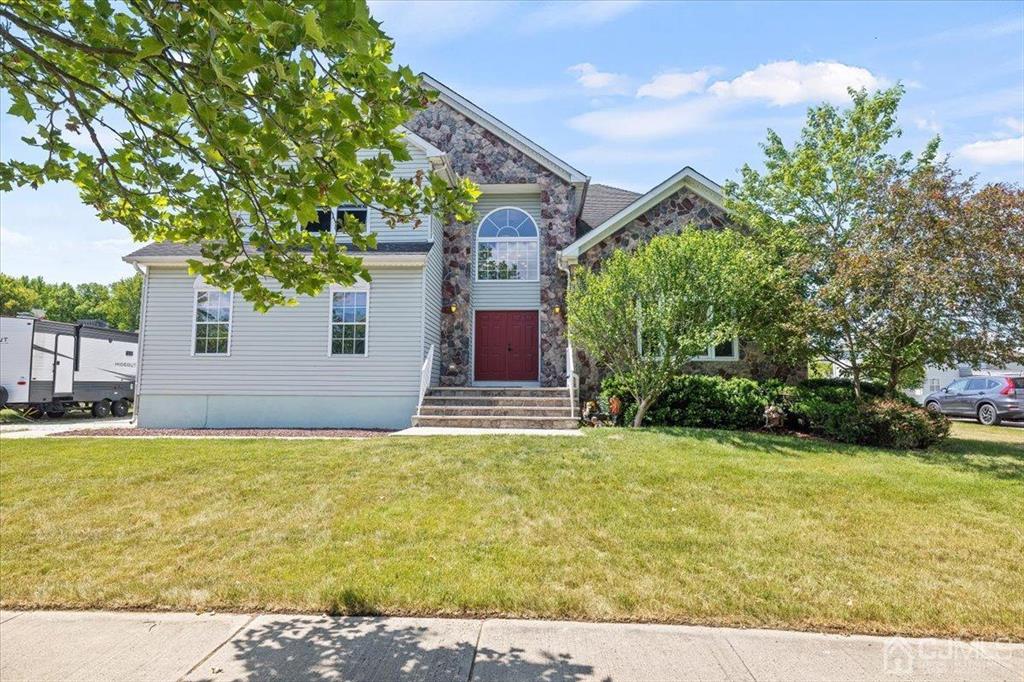 22 Mapleton Road Old Bridge, NJ 08857 - Photo 3 of 40 a house view with a outdoor space