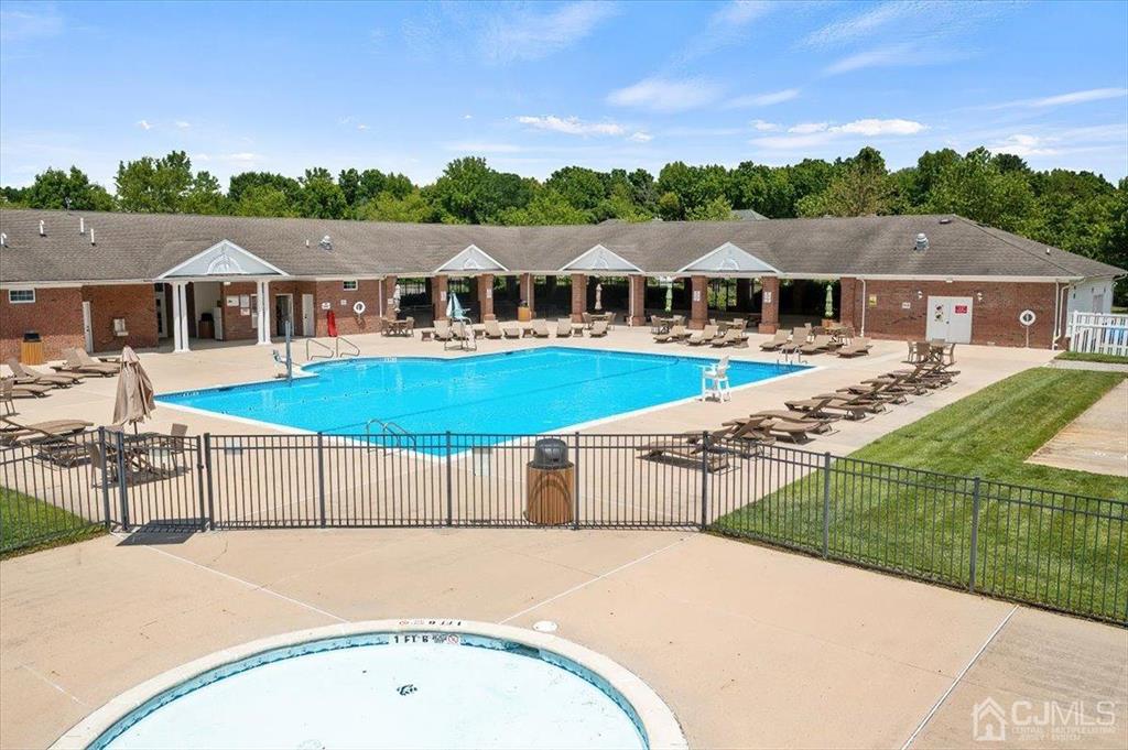 22 Mapleton Road Old Bridge, NJ 08857 - Photo 34 of 40 a view of a house with pool and a yard