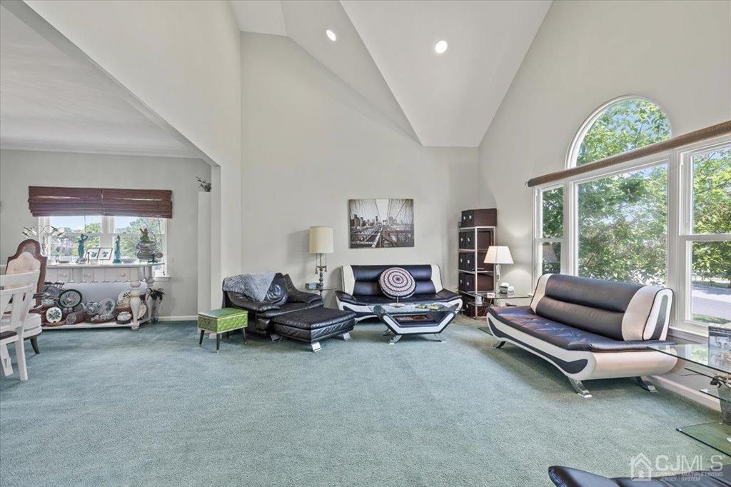 22 Mapleton Road Old Bridge, NJ 08857 - Photo 8 of 40 a living room with furniture and a large window