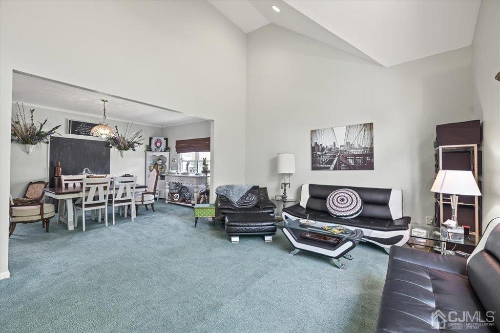 22 Mapleton Road Old Bridge, NJ 08857 - Photo 10 of 40 a living room with furniture and a table
