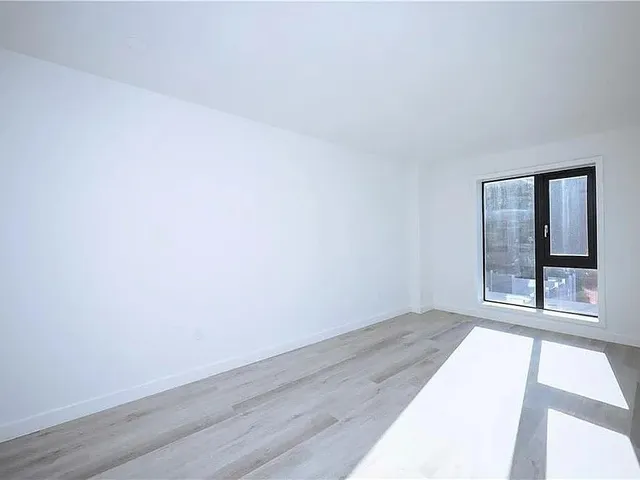 an empty room with window