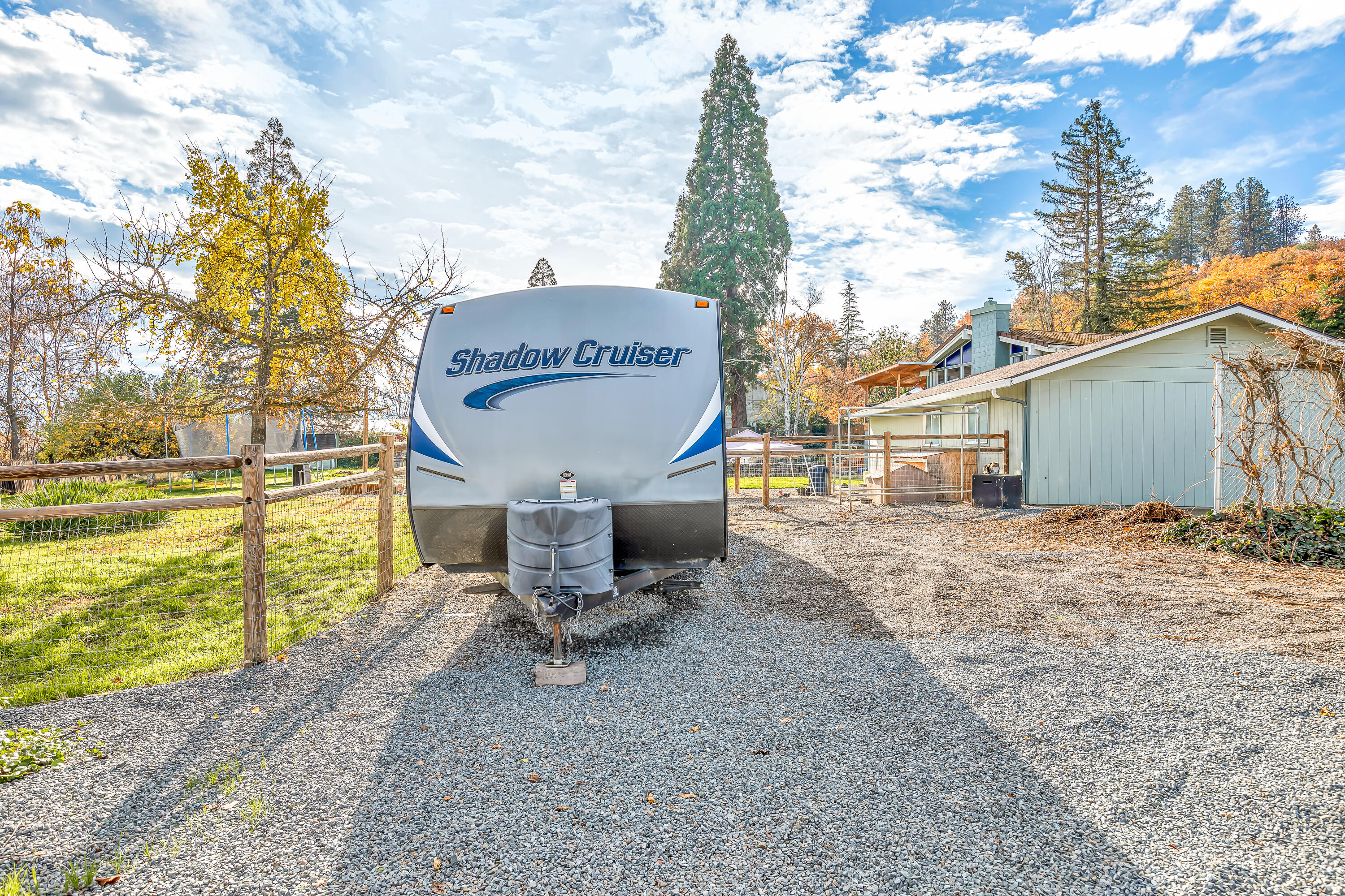 3010 Sylvia Road Central Point, OR 97502 - Photo 54 of 65 a sign board with a yard and large trees