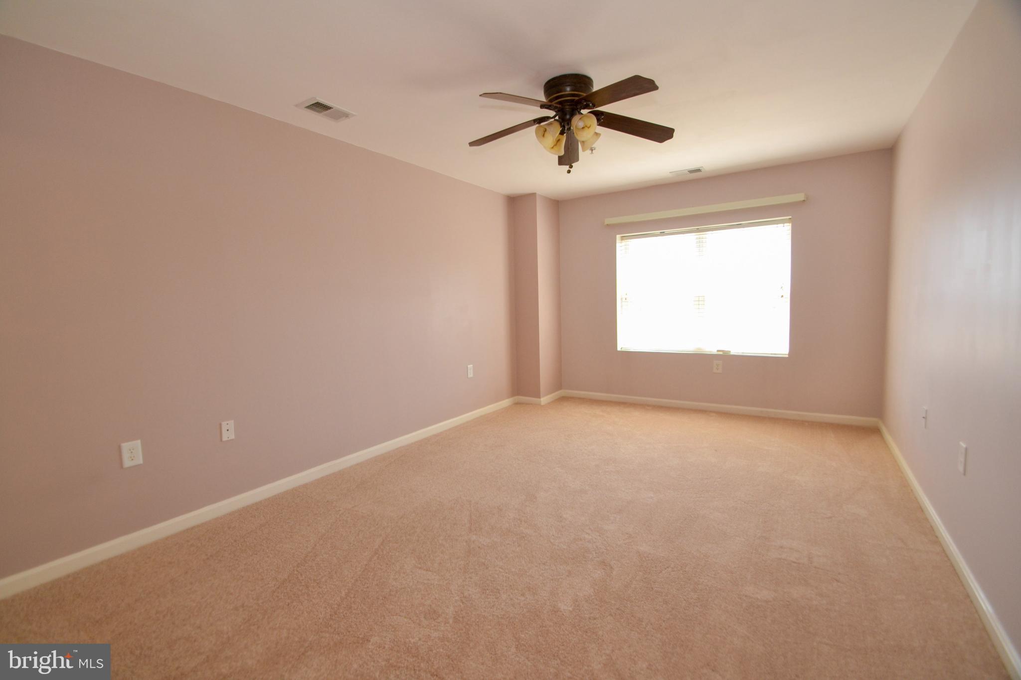 12246 Roundwood Road, Unit 701 Lutherville-Timonium, MD 21093 - Photo 13 of 24 Primary bedroom