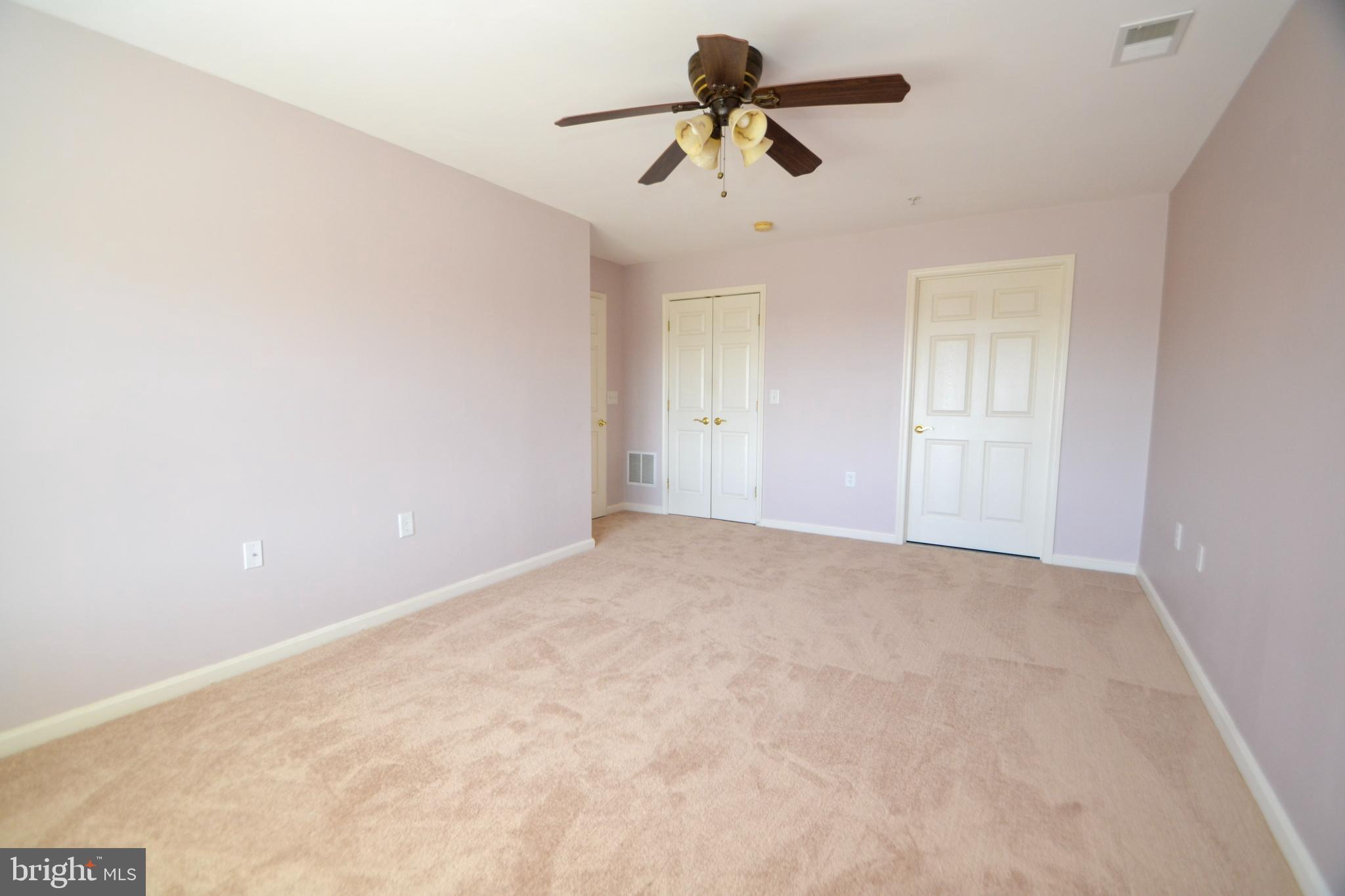 12246 Roundwood Road, Unit 701 Lutherville-Timonium, MD 21093 - Photo 14 of 24 Primary bedroom