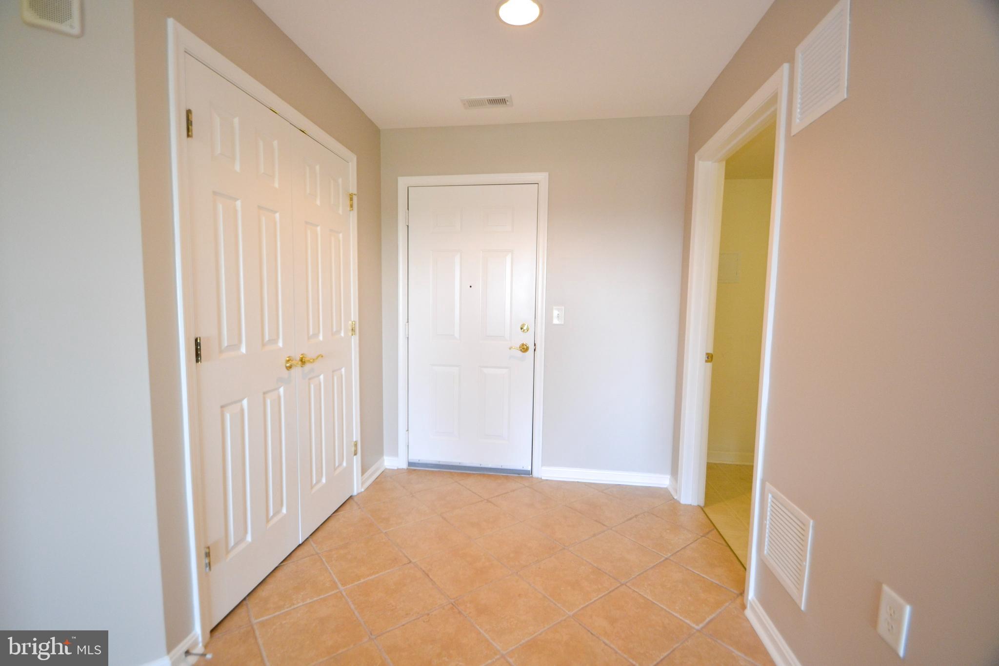 12246 Roundwood Road, Unit 701 Lutherville-Timonium, MD 21093 - Photo 2 of 24 Foyer