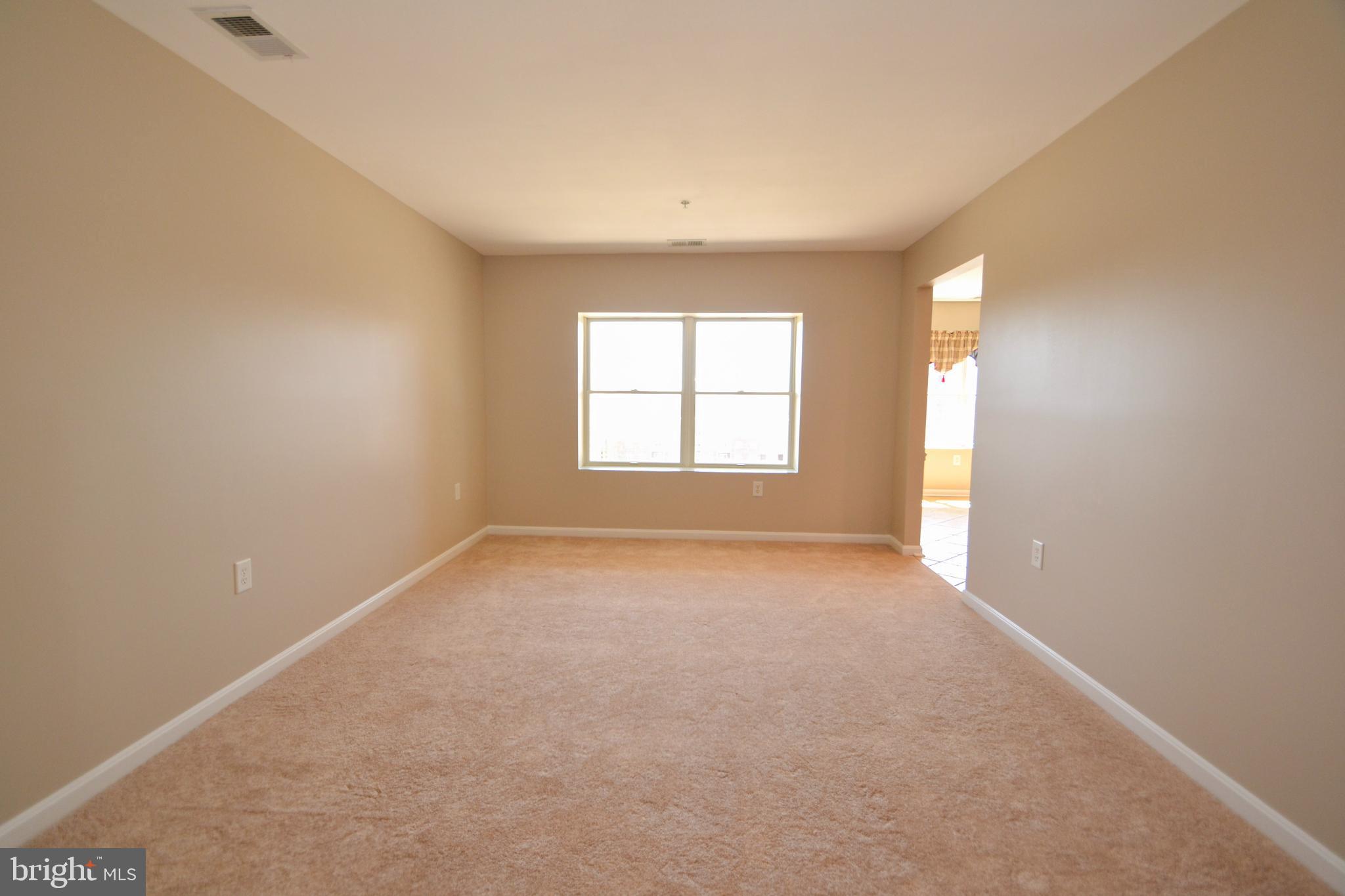 12246 Roundwood Road, Unit 701 Lutherville-Timonium, MD 21093 - Photo 3 of 24 Living room