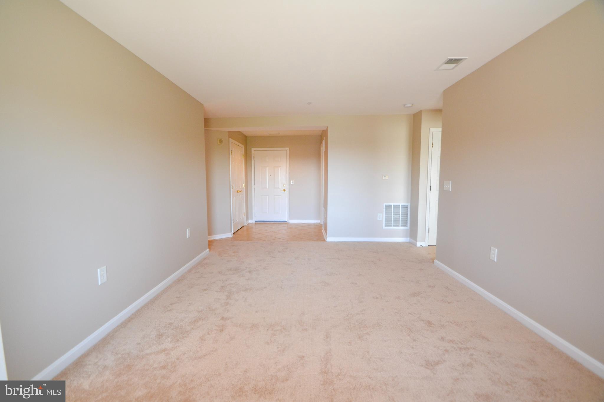 12246 Roundwood Road, Unit 701 Lutherville-Timonium, MD 21093 - Photo 4 of 24 Living room