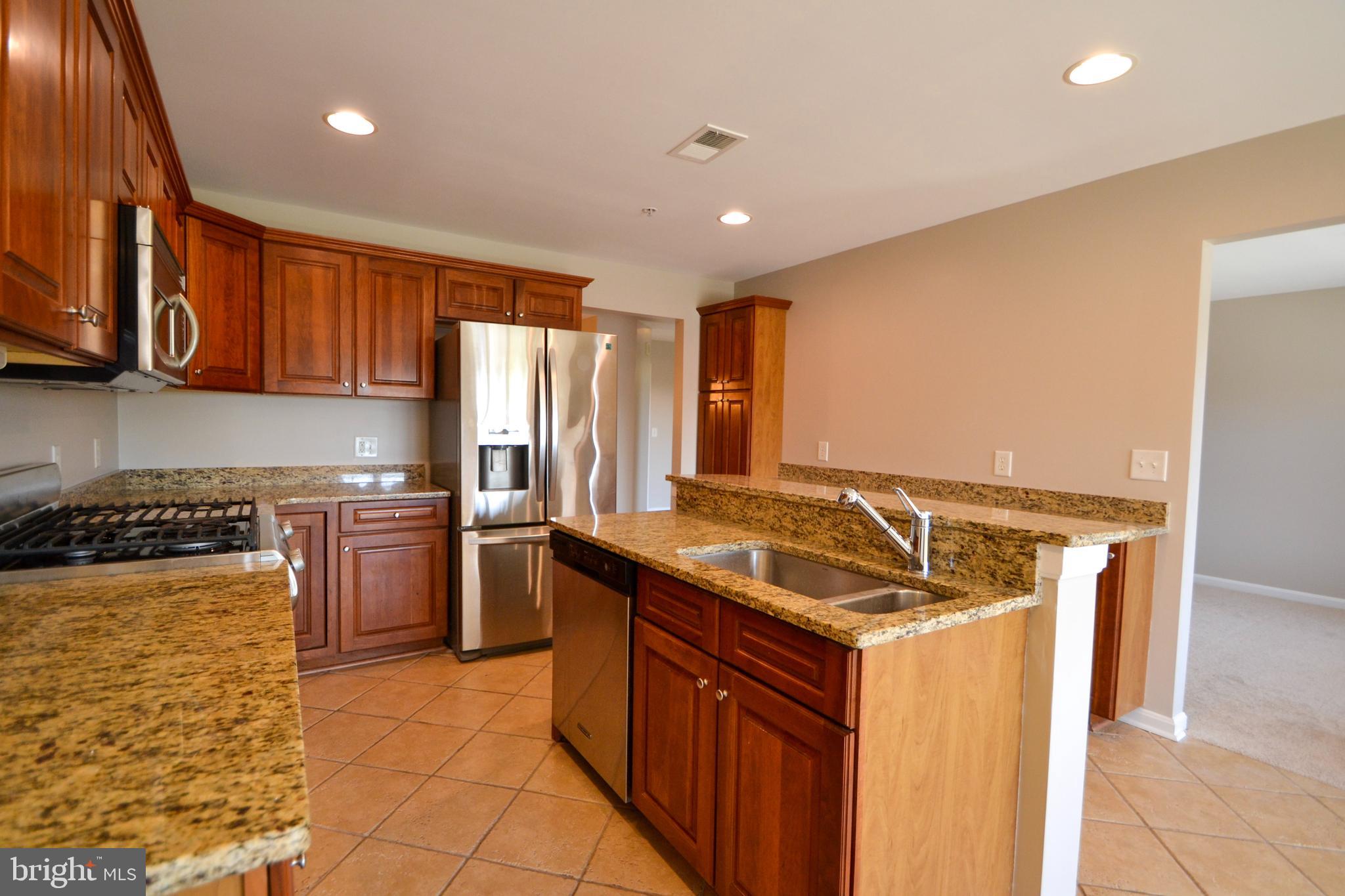 12246 Roundwood Road, Unit 701 Lutherville-Timonium, MD 21093 - Photo 7 of 24 Kitchen