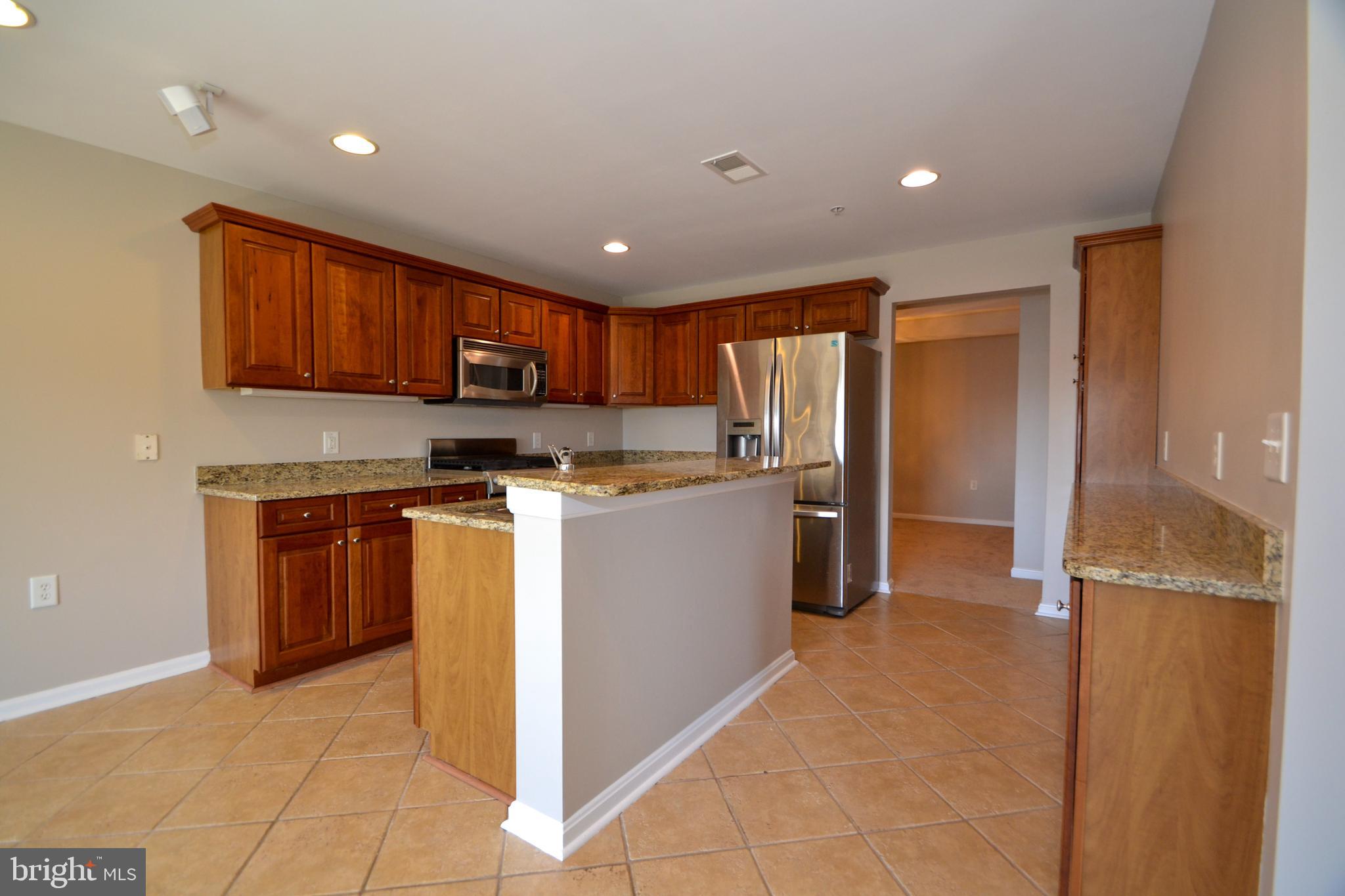 12246 Roundwood Road, Unit 701 Lutherville-Timonium, MD 21093 - Photo 10 of 24 Kitchen