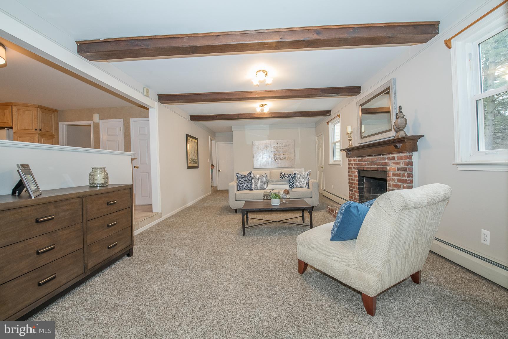 12 Ashlawn Road Malvern, PA 19355 - Photo 12 of 33 Family Room has a wood-burning fireplace.