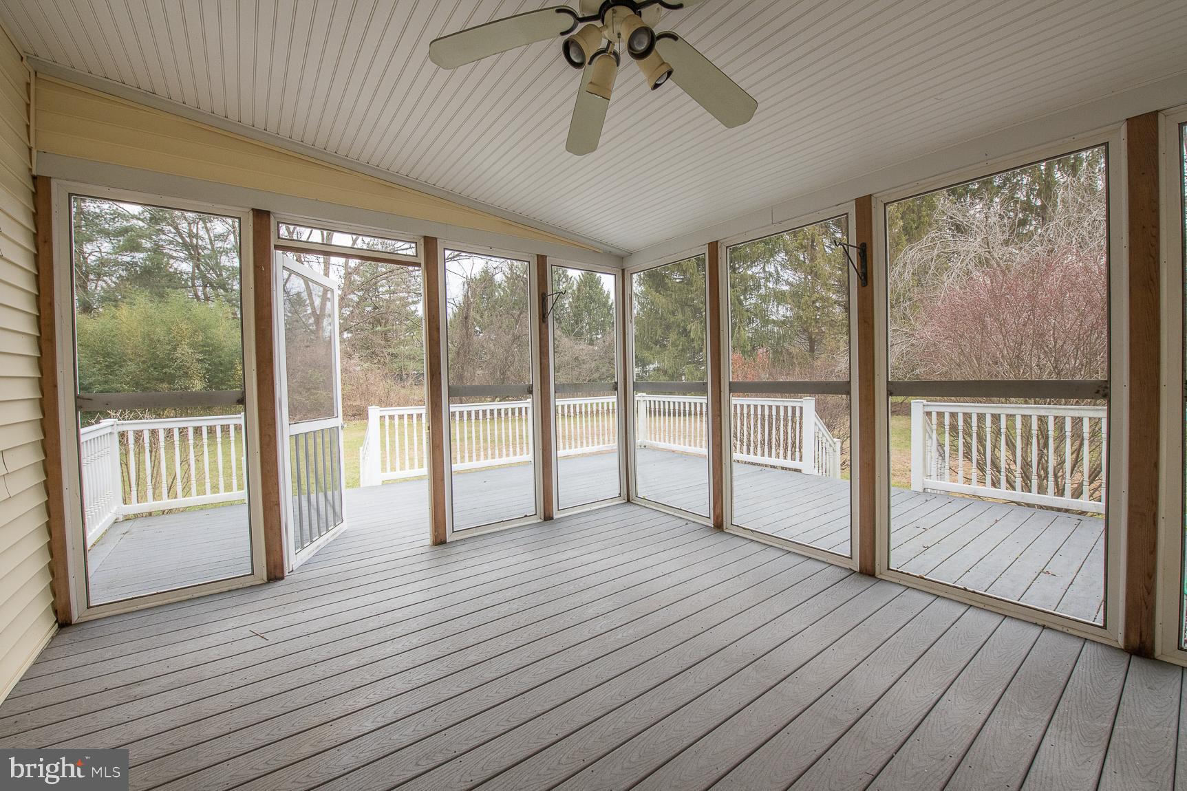 12 Ashlawn Road Malvern, PA 19355 - Photo 17 of 33 Screened-in Porch with ceiling fan.