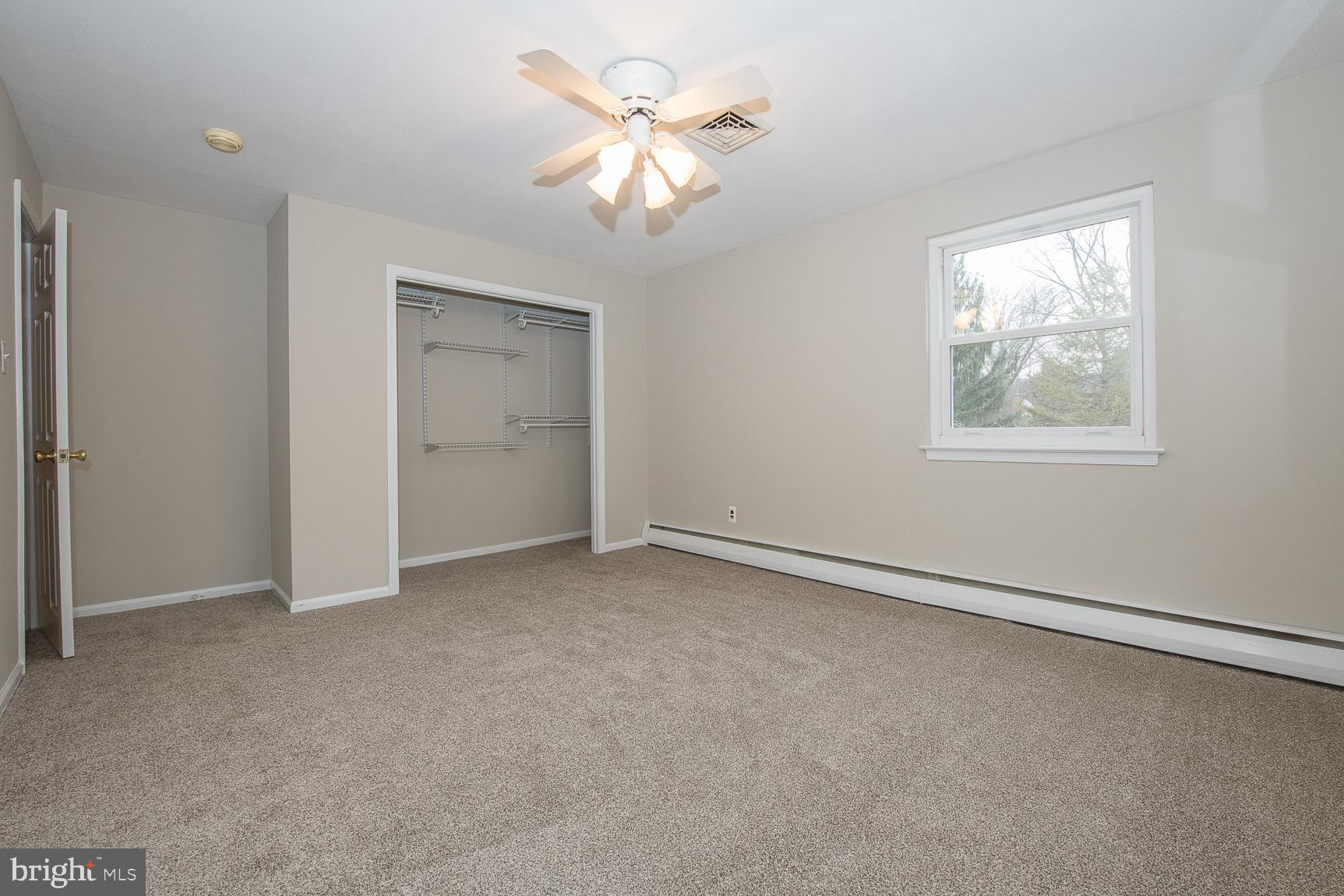 12 Ashlawn Road Malvern, PA 19355 - Photo 25 of 33 Bedroom #3: ceiling fan and closet shelving system