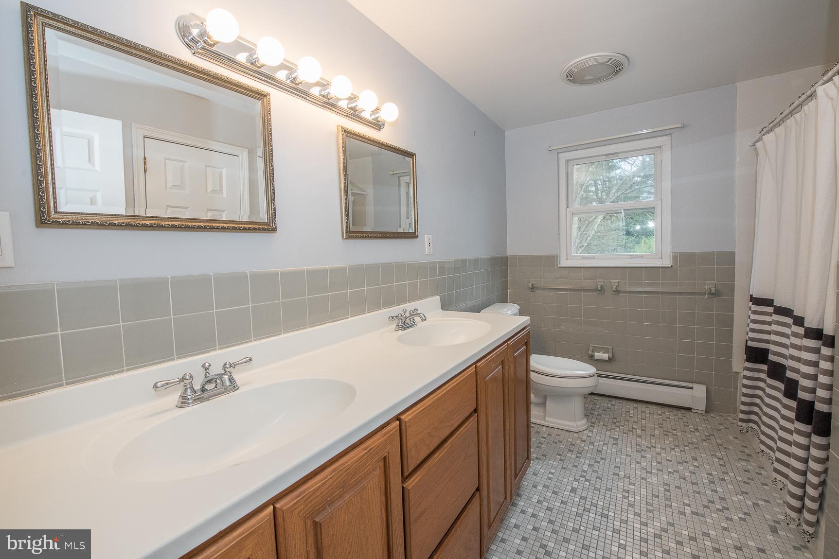12 Ashlawn Road Malvern, PA 19355 - Photo 26 of 33 Hall Bathroom with double sink vanity