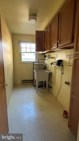 a room with chairs and closet