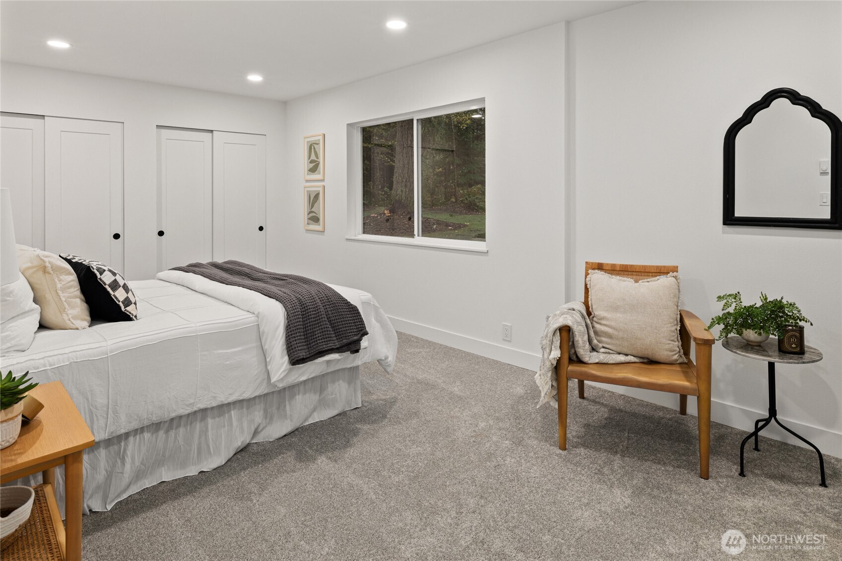 12528 Odell Road Northeast Duvall, WA 98019 - Photo 20 of 39 a bedroom with a bed and chair