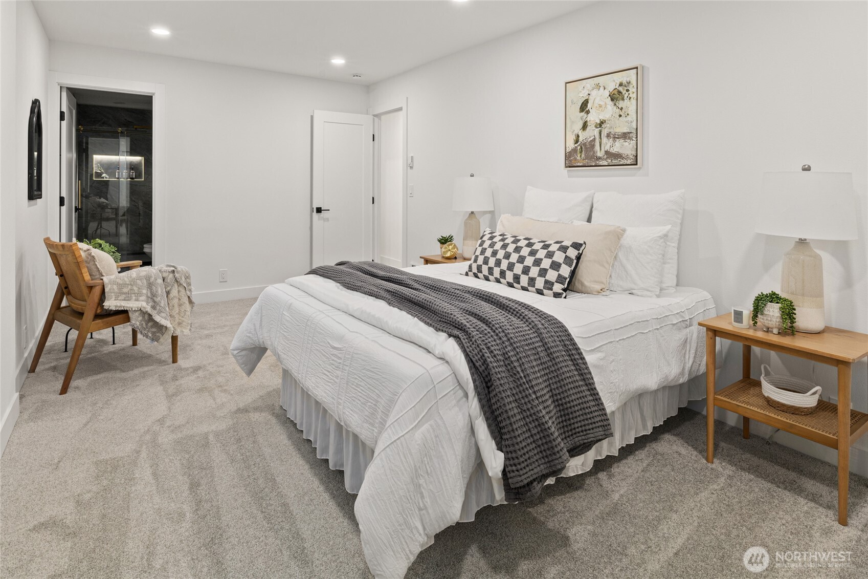 12528 Odell Road Northeast Duvall, WA 98019 - Photo 22 of 39 a bedroom with a bed and a chair