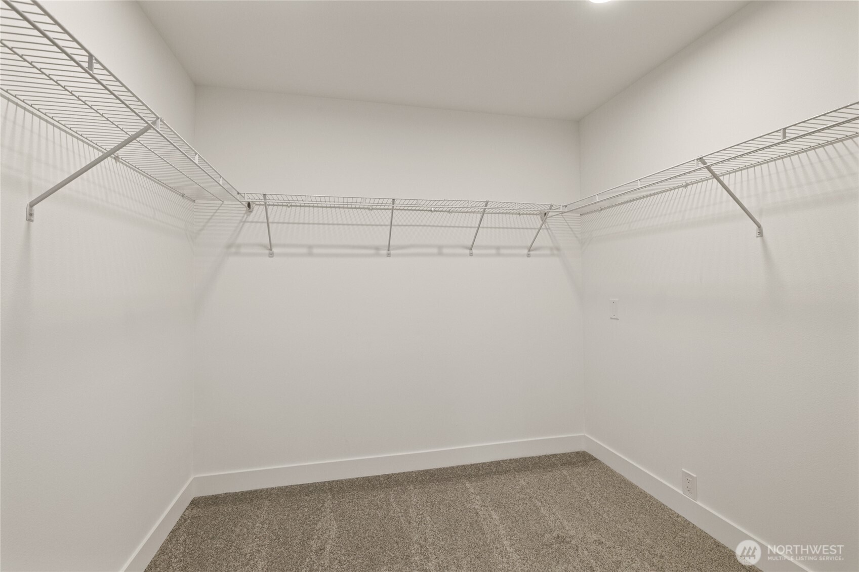 12528 Odell Road Northeast Duvall, WA 98019 - Photo 29 of 39 a view of a room with racks on the wall