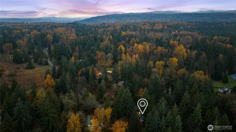 a view of a lake in middle of the city