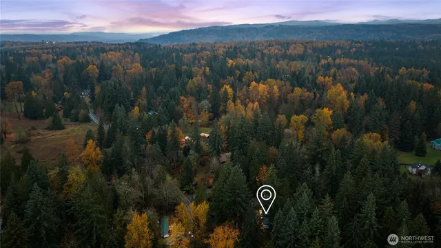 a view of a lake in middle of the city
