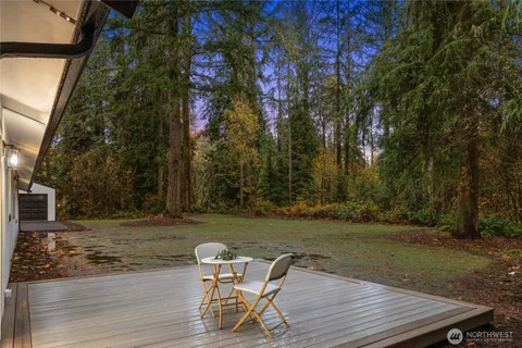 a view of a wooden chairs and table on the wooden floor