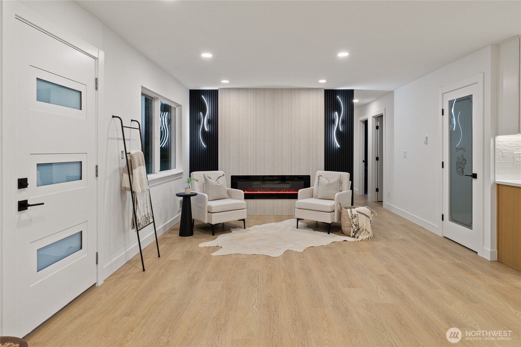 12528 Odell Road Northeast Duvall, WA 98019 - Photo 5 of 39 a living room with furniture and a flat screen tv