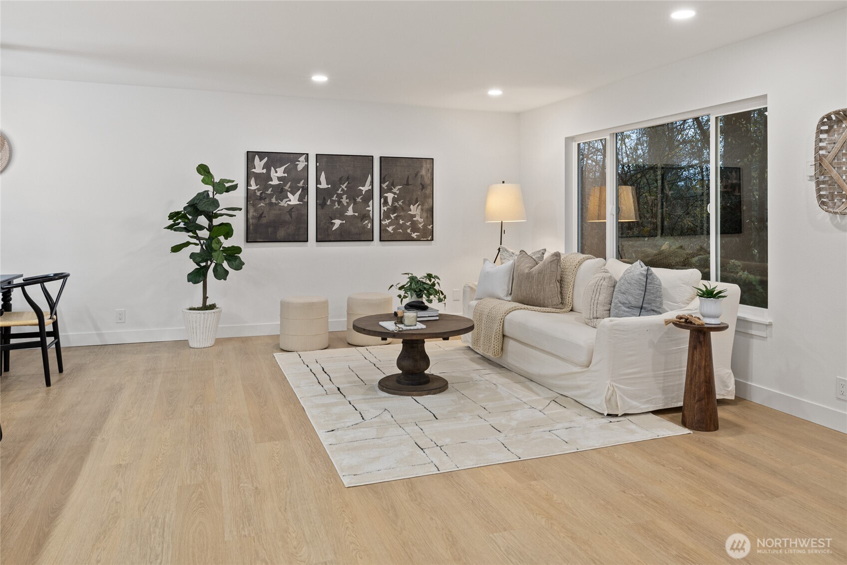 12528 Odell Road Northeast Duvall, WA 98019 - Photo 7 of 39 a living room with furniture and a potted plant