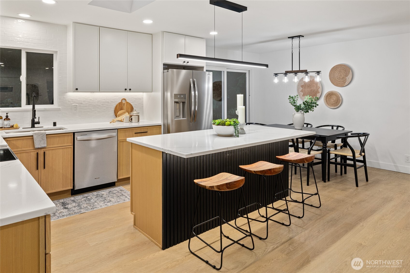12528 Odell Road Northeast Duvall, WA 98019 - Photo 8 of 39 a kitchen with stainless steel appliances granite countertop a sink a stove and a refrigerator