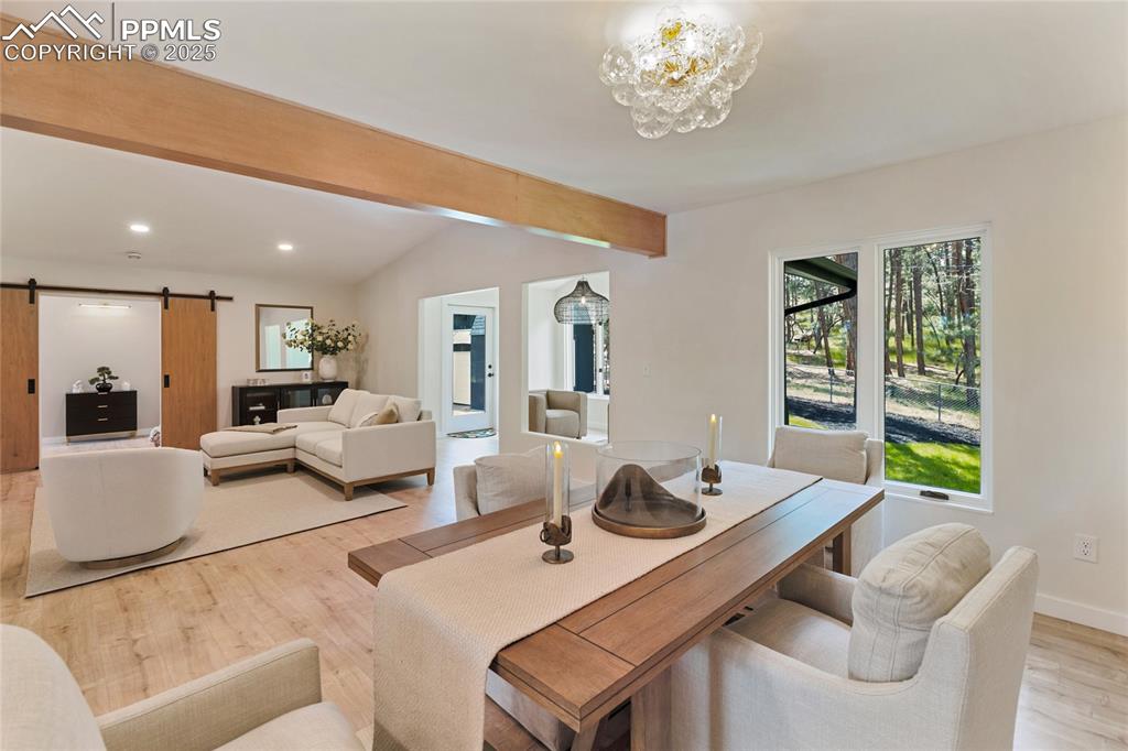 1320 Spring Valley Drive Colorado Springs, CO 80921 - Photo 18 of 46 a living room with furniture and a large window