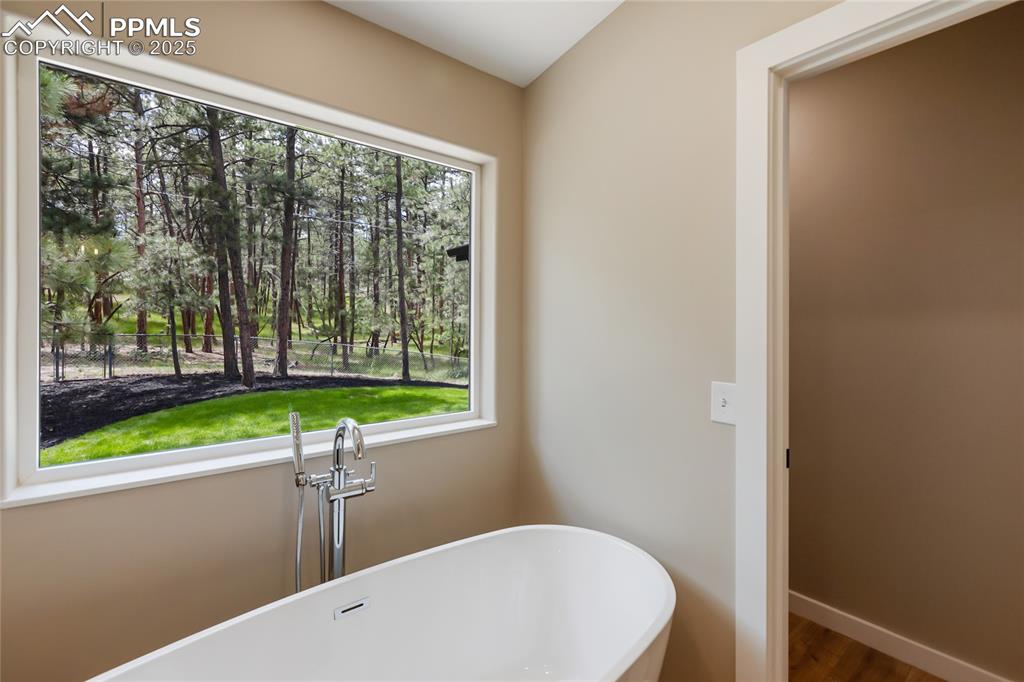 1320 Spring Valley Drive Colorado Springs, CO 80921 - Photo 23 of 46 a bathroom with a sink and a window