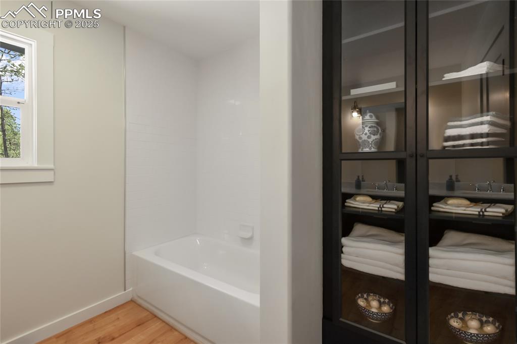 1320 Spring Valley Drive Colorado Springs, CO 80921 - Photo 28 of 46 a bathroom with a bathtub