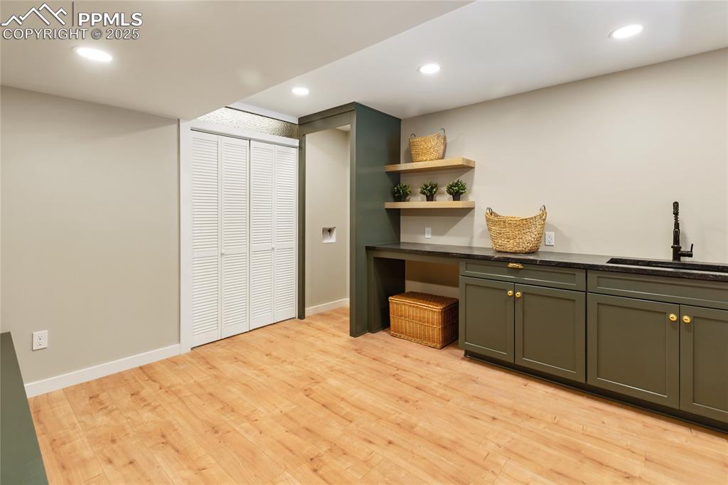1320 Spring Valley Drive Colorado Springs, CO 80921 - Photo 35 of 46 a bedroom with a bed and cabinets