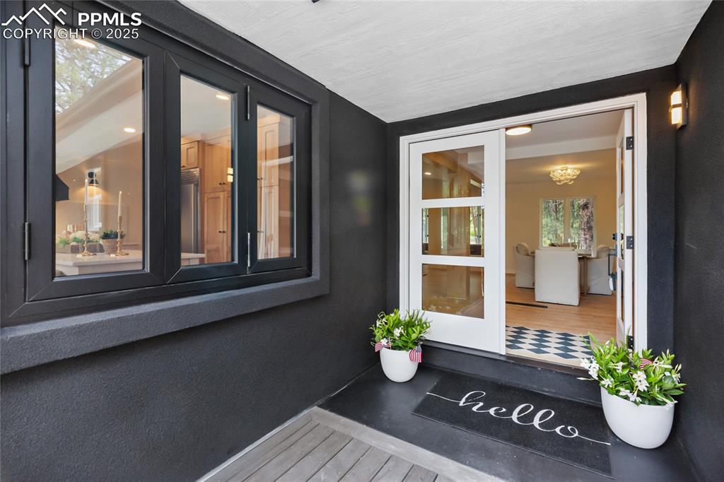 1320 Spring Valley Drive Colorado Springs, CO 80921 - Photo 4 of 46 a view of an entryway with wooden floor