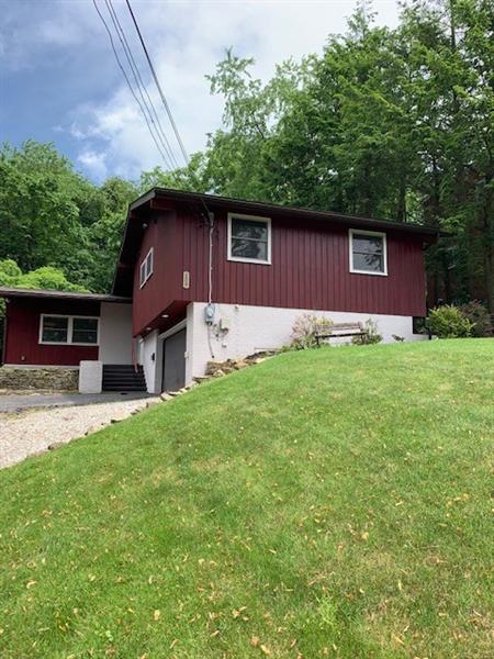 One of a kind 3 BR multi level.  Two car garage, 2 1/2 baths.  large room, open floor plan.  Private back yard area with side and back deck.  Lower level game room with and laundry area.   New roof, furnace and many updates thru out.   Home warranty offered.  